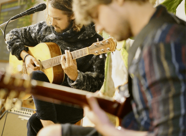 two guys with guitars