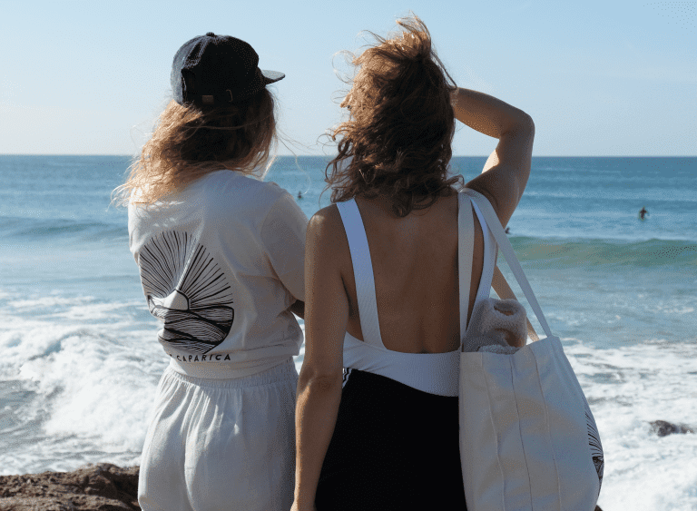 girls checking out the waves