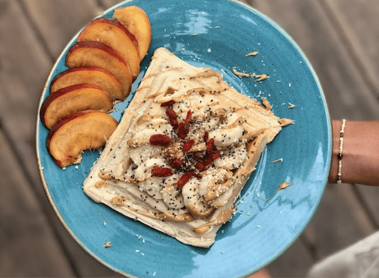 breakfast with waffles and fruits